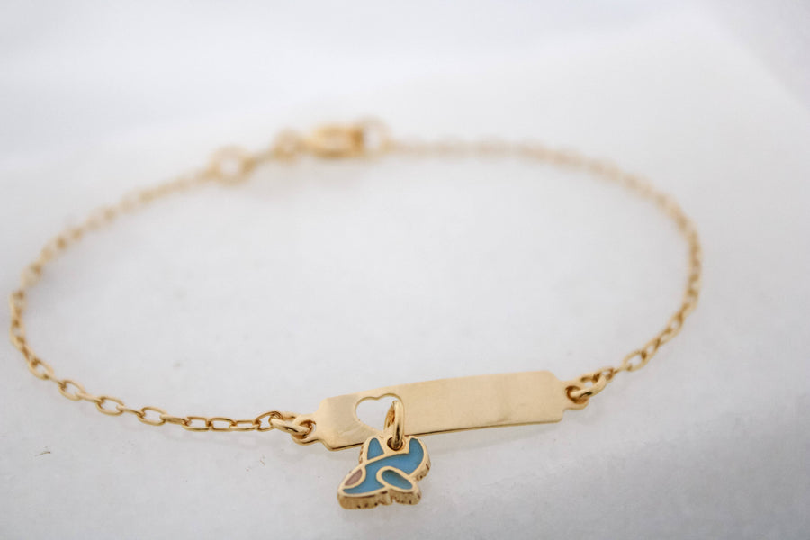 Pulsera infantil con dije avión